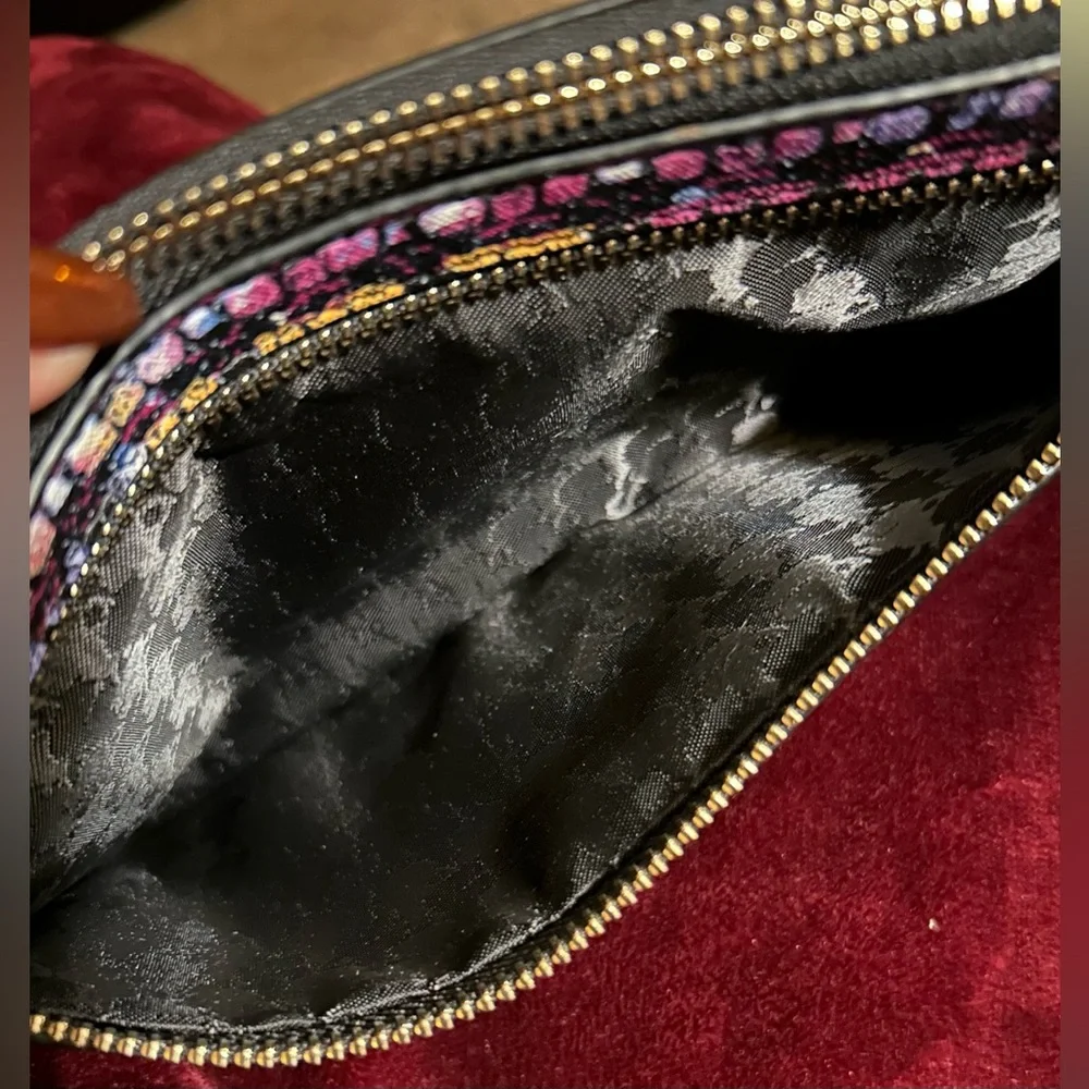 Karl Lagerfeld Paris Double Zip Wristlet Pouch Clutch in a plum combo print.